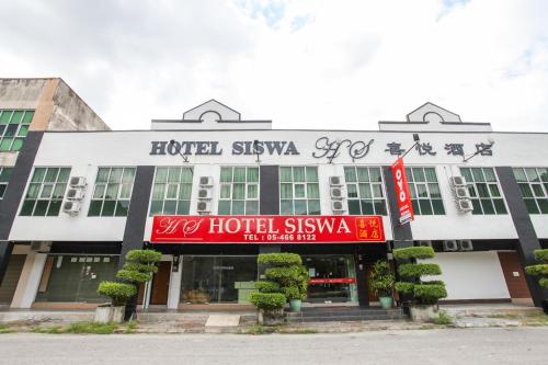 Фотографии гостиницы 
            OYO 89539 Hotel Siswa