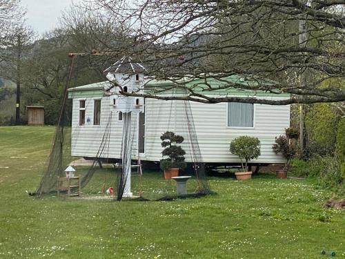 Фотографии гостевого дома 
            The Nest - Family friendly caravan nr Glastonbury & Street