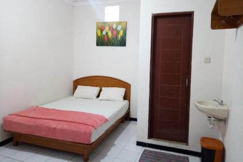 Фотография гостиницы OYO 3042 Griya Karangsalam Indah