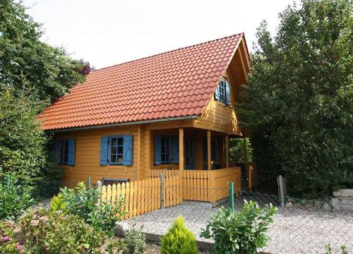 Фотографии гостевого дома 
            Holzhaus-Grömitz Das kleine Holzhaus