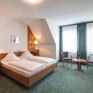 Фотографии гостевого дома 
            Hotel-Gästehaus Alte Münze