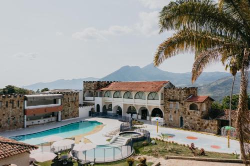 Фотографии гостиницы 
            Hotel El Castillo Chinauta