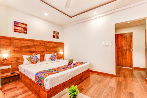 Фотографии гостиницы 
            FabHotel Vista Suites Bangalore East Railway Station