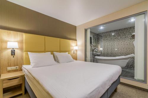 Фотография номера гостиницы АМАКС Отель Омск