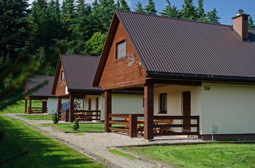 Фотография гостевого дома Domki Pod Lasem