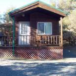 Фотография базы отдыха Lake of the Springs Camping Resort Cabin 4