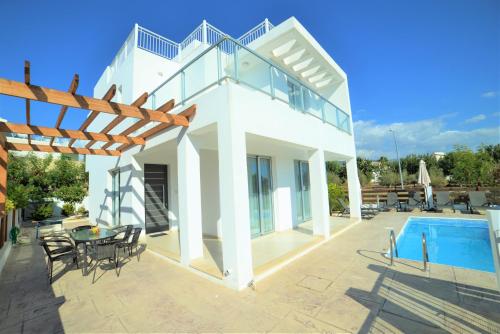 Фотографии гостевого дома 
            Coral Bay Villa 10