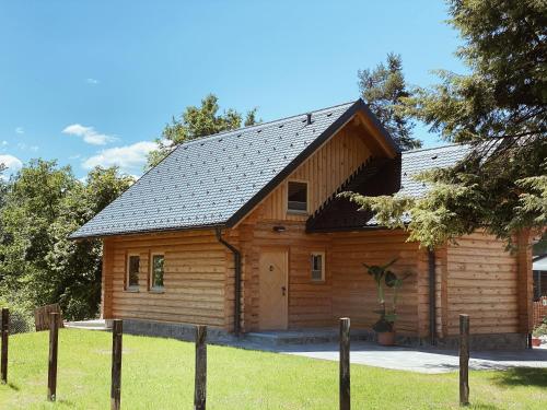 Фотографии гостевого дома 
            Log House Natura