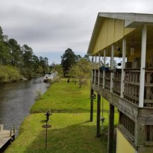 Фотографии гостевого дома 
            Aqua House, Bayou Vacation Home