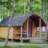 Фотография базы отдыха Patten Pond Camping Resort Cabin 8