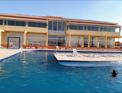 Фотография гостевого дома Chale Cantinho do Sol Catarina Home Club