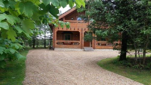 Фотография кемпинга Forest Lodge Log Cabin - Ireland
