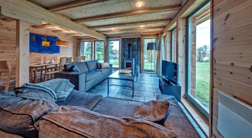 Фотография гостевого дома traumHaff Küstenchalets - einzigartige Chalets an der Ostsee. Ganz aus Lärchenholz mit Kamin und Sauna