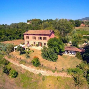 Фотография гостевого дома A nice rural house surrounded by hills and fields