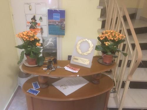 Фотография гостевого дома Olympiades Rooms & Apartments