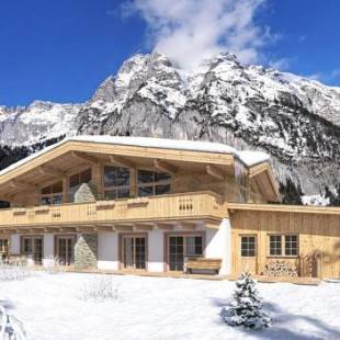 Фотографии гостевого дома 
            Alpenchalet im Leutaschtal