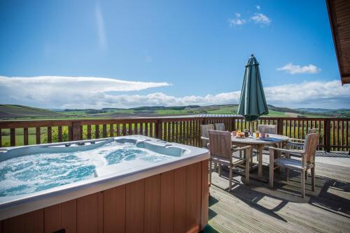 Фотографии гостевого дома 
            Barn Lodge with Hot Tub near Cupar Fife