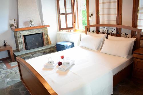 Фотография гостевого дома Φιλυρέα - Ενοικιαζόμενα Δωμάτια