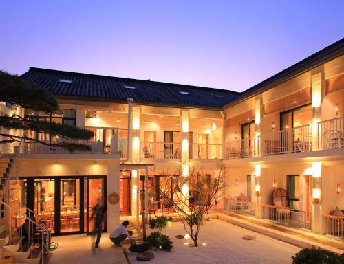 Фотография мини отеля Hangzhou Shange Laolongjing Hotel