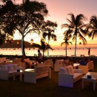 Фотографии гостиницы 
            Café de Playa beach front suites