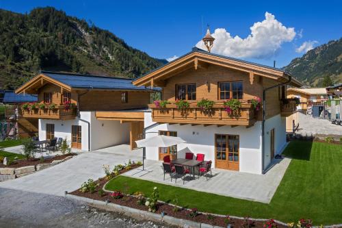 Фотография гостевого дома Hochalmbahnen Chalets Rauris 1-01 Maislaufeldweg 1a