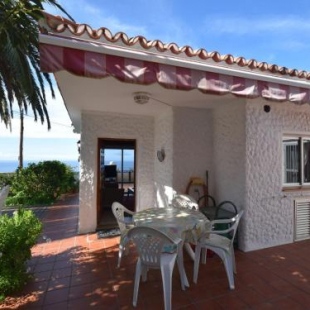 Фотография гостевого дома Cozy Holiday Home in Mesa del Mar with Sea View