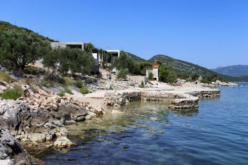 Фотография гостевого дома Apartments by the sea Cove Pjestata, Peljesac - 10210