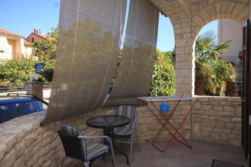 Фотография гостевого дома Apartments with a parking space Fazana - 7234