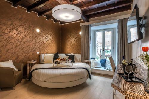 Фотографии гостевого дома 
            Spagna Luxury'n Trevi