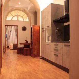 Фотографии гостевого дома 
            Boutique Cavour Apartment