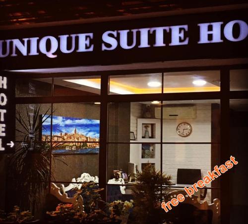 Фотографии гостиницы 
            Unique Suite Hotel