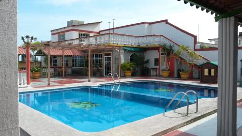 Фотографии гостиницы 
            Hotel y Bungalows Monteverde