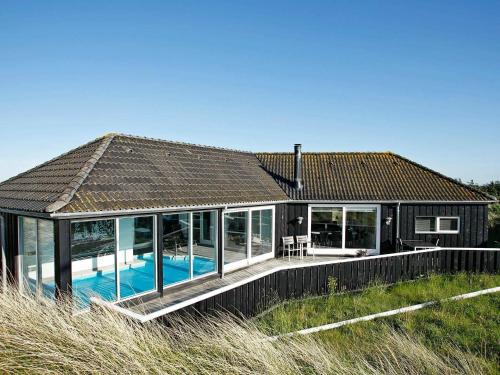 Фотографии гостевого дома 
            Four-Bedroom Holiday home in Hirtshals 4