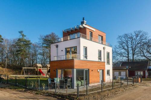 Фотография гостевого дома Ferienhaus-See-Sauna-Kamin mit E-Ladestation