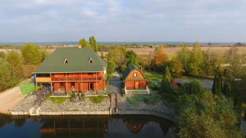 Фотографии гостевого дома 
            Загородный V.I.P. комплекс с басейном и озером