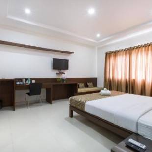 Фотографии мини отеля 
            Sanctum Suites BEL Road Bangalore