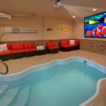 Фотография гостевого дома Legends Pool Lodge