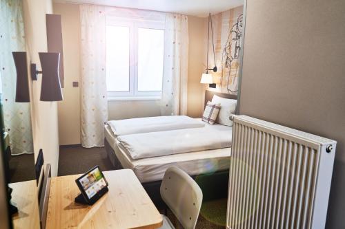 Фотография гостиницы McDreams Hotel München-Airport