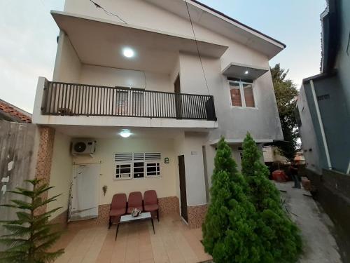 Фотография гостиницы Kost Carmelia Syariah Baranangsiang Bogor