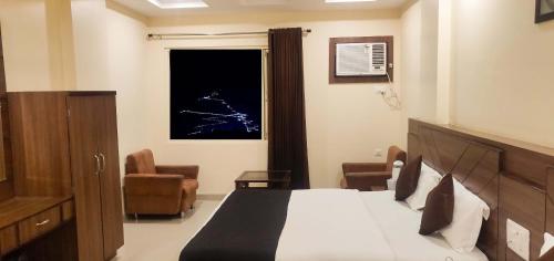 Фотографии гостиницы 
            Hotel The Vaishno Devi Hills