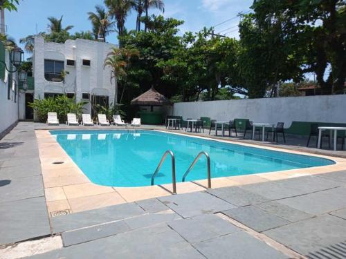 Фотографии гостиницы 
            Hotel Guarujá Inn Tropical