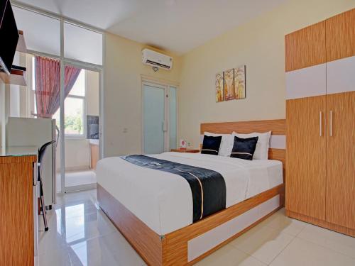 Фотография гостиницы OYO 90253 DHelomi