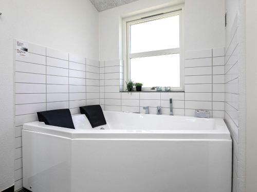 Фотография гостевого дома Holiday home Løkken LX