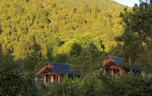 Фотографии гостевого дома 
            Chalets de Montaña en Caburgua