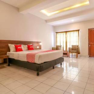 Фотографии гостиницы 
            OYO 1384 Pulau Bali Hotel