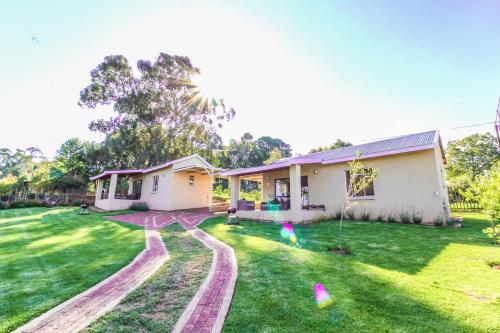 Фотография гостевого дома Cinzaco Dullstroom