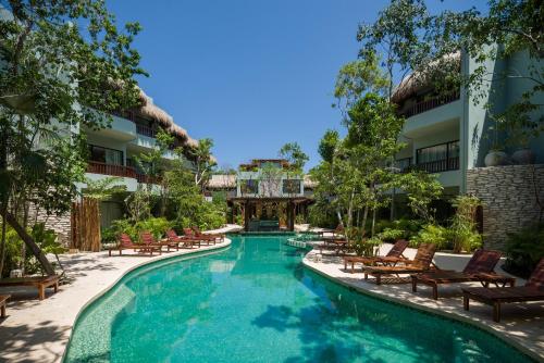 Фотографии гостиницы 
            Kimpton - Aluna Tulum, an IHG Hotel