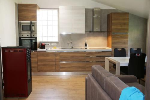 Фотография гостевого дома Casa Vacanze il Giardino - Appartamento Agrifoglio