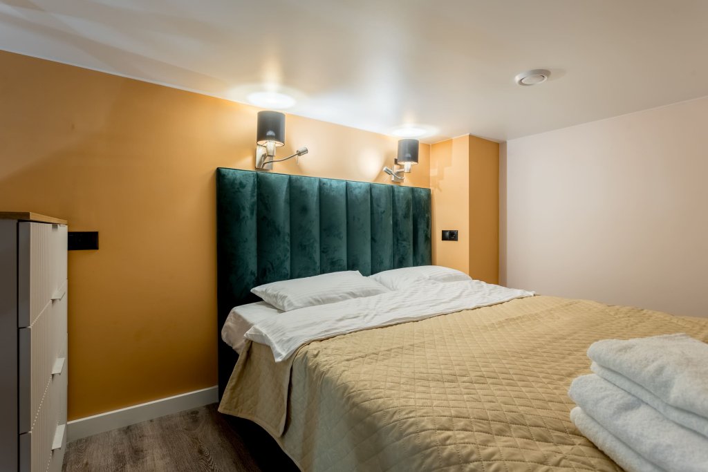 Фотография квартиры Апартаменты InHome24 Стильные двухуровневые апартаменты HomeCity