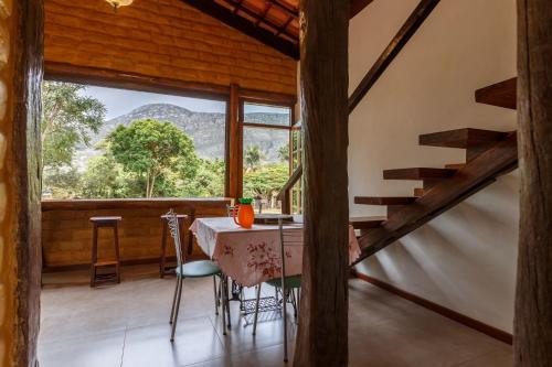 Фотография гостевого дома Chalé Canto do Vento Lapinha da Serra